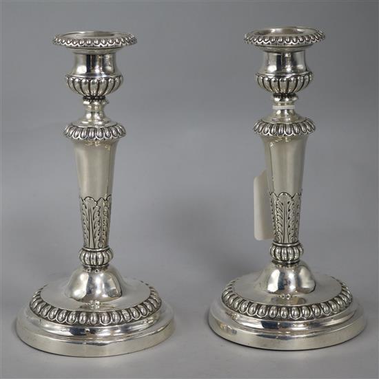 A pair of George III silver candlesticks, by Matthew Boulton, Birmingham 1808, loaded bases, h. 19.5cm